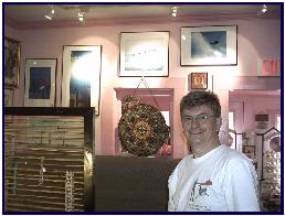 Pascal Lecocq in front some of his paintings at TPM Gallery, Katy (Tx) 