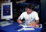 Pascal signing at the Dema show,  photo D.Deflorin