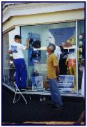 Mural on window at Uzzi store in Sarasota